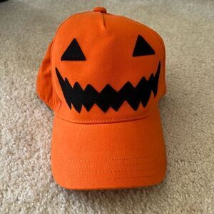 Gymboree age 8 & up Jack o lantern ball caps.